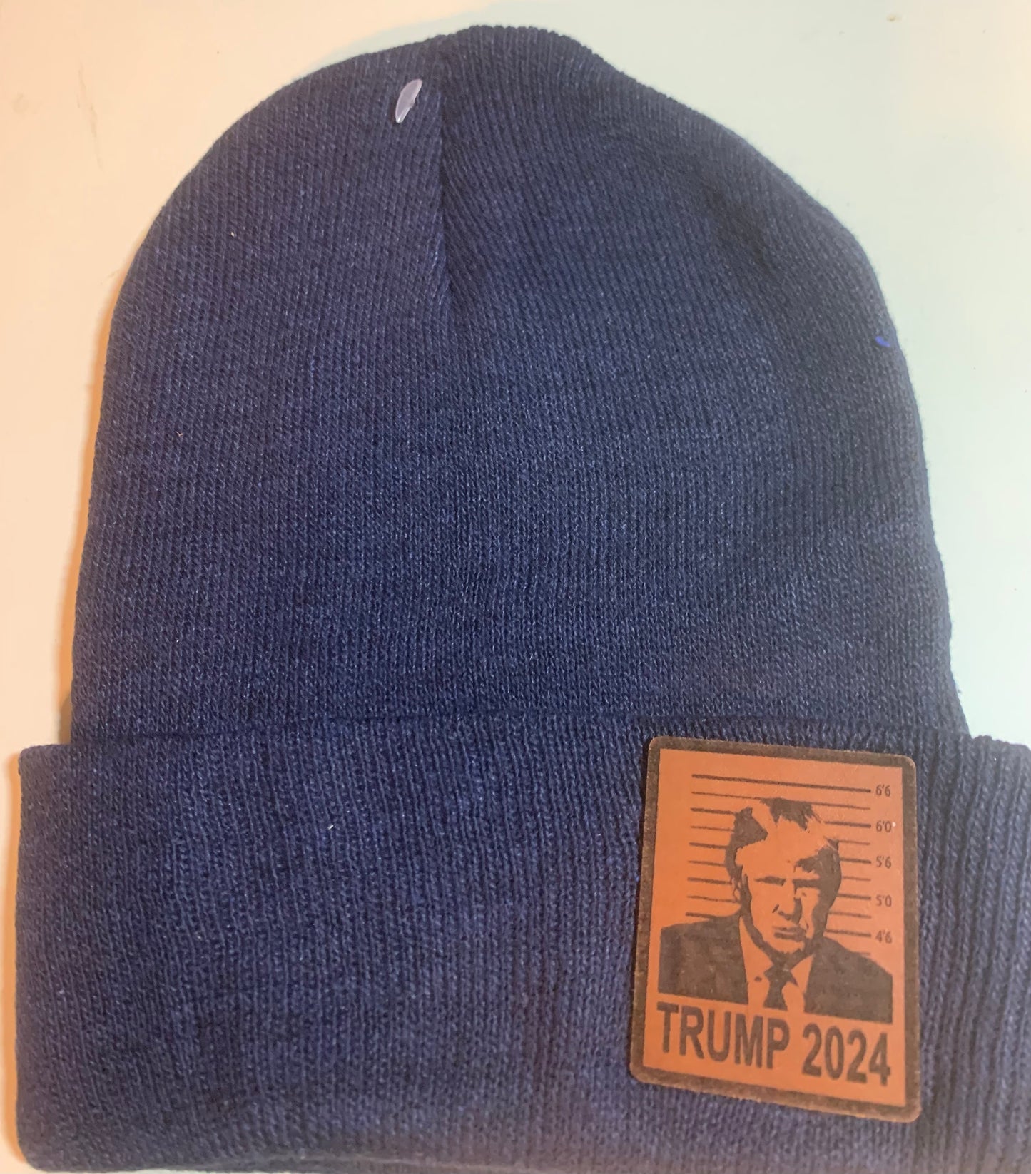 Navy blue beanie with a trump patch quick ship combo