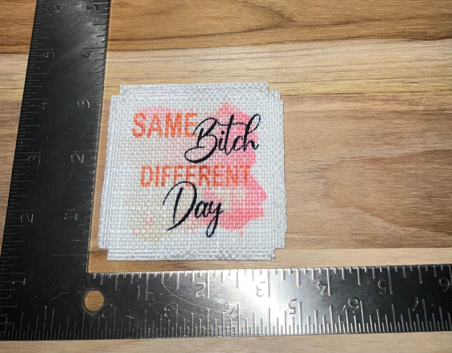 Her patch "same bitch different day"