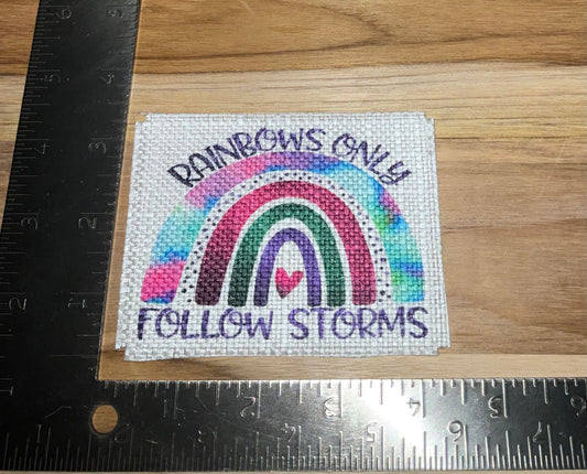 Her patch "rainbows only follow storms"