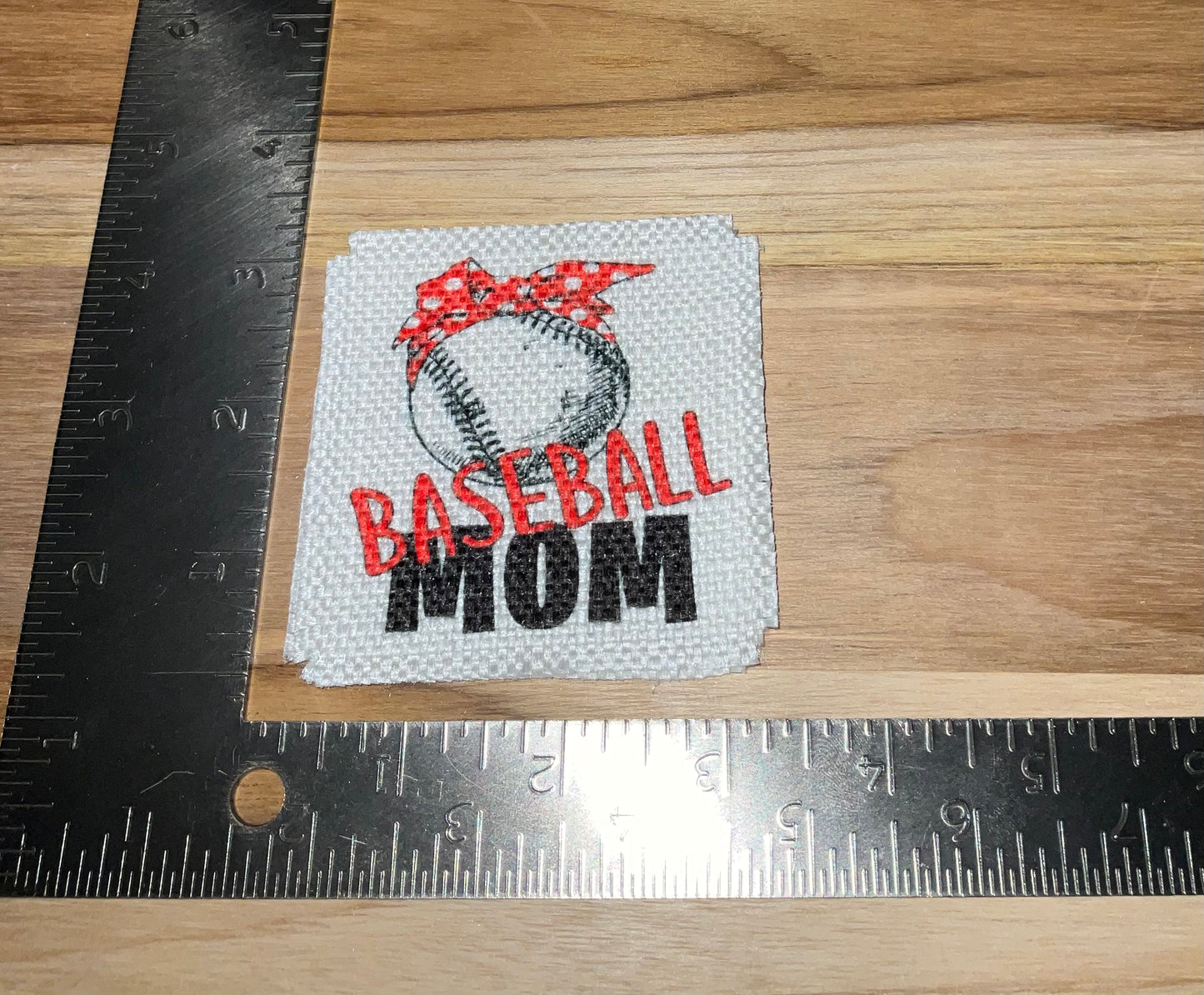 Her patch "baseball mom"