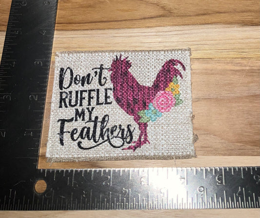 Her patch "don’t ruffle my feathers" tan