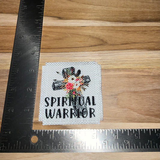 Her patch "spiritual warrior"