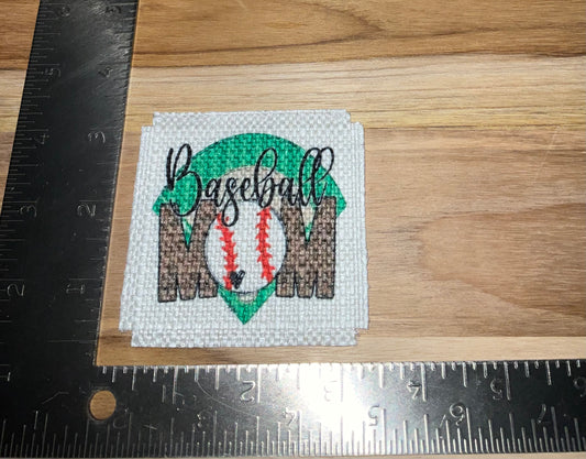 Her patch "baseball mom"